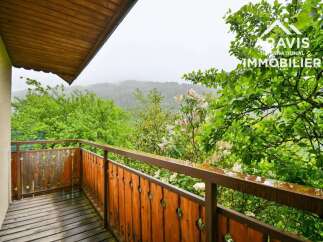 Enjoy breathtaking views from this charming balcony.