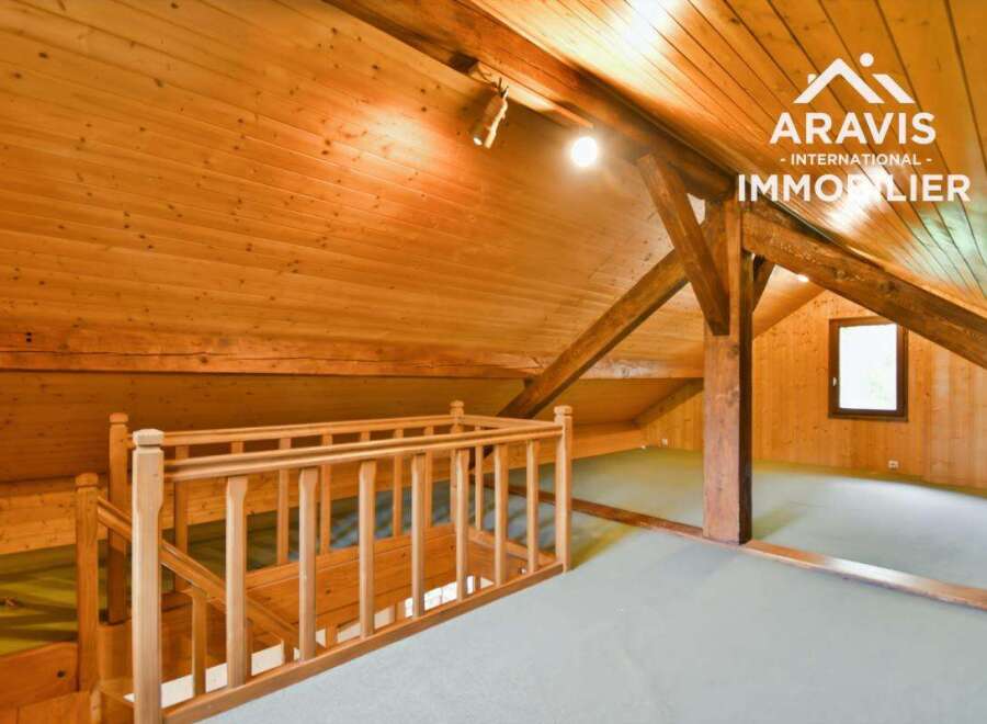 Discover the charm of this stunning property, featuring a beautifully crafted wooden interior.