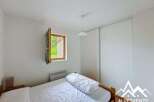 Discover a cozy bedroom with natural light and a serene ambiance.