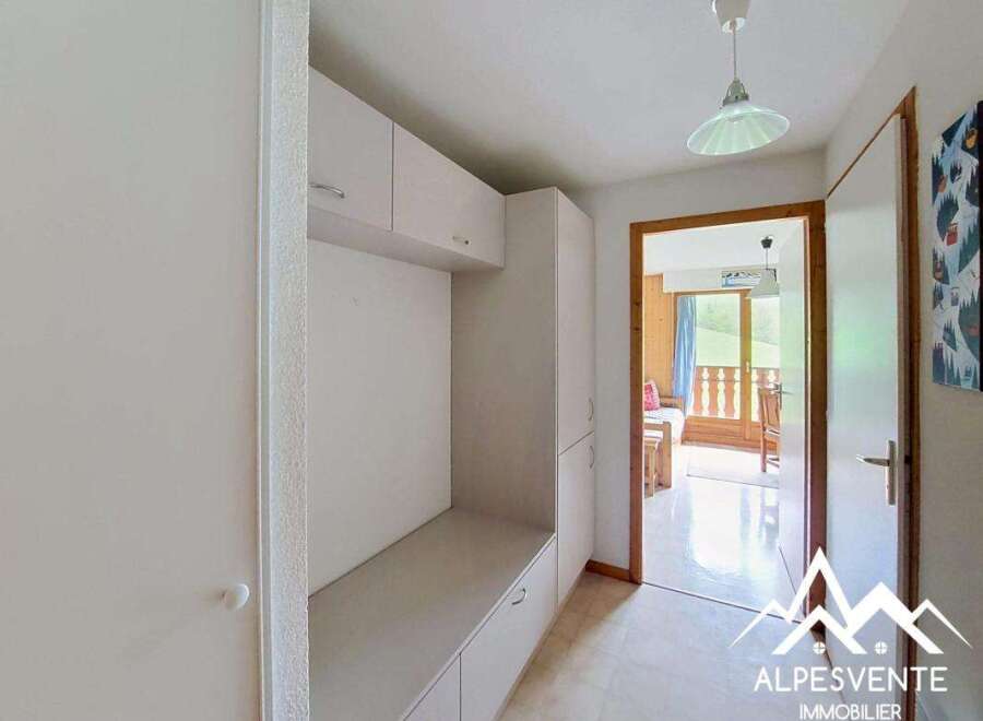 Discover this charming property featuring a bright hallway with built-in storage.