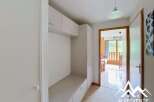 Discover this charming property featuring a bright hallway with built-in storage.