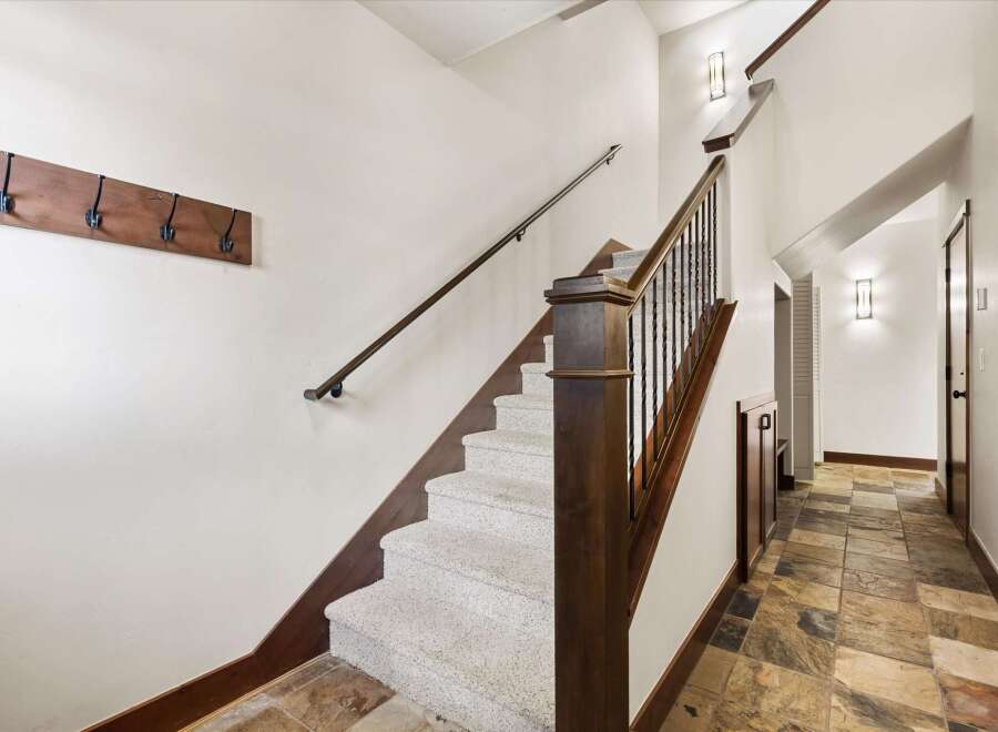 This stunning property features a beautifully designed staircase, perfect for making a grand entrance.