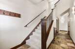 This stunning property features a beautifully designed staircase, perfect for making a grand entrance.