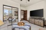 Step into luxury with this stunning property, featuring a spacious living area perfect for relaxation and entertainment.