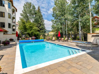 Enjoy a relaxing day by the pool at this stunning property.