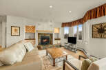 This stunning living room features a cozy fireplace, perfect for relaxing evenings.