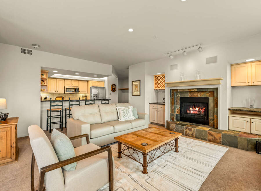 This stunning living room features a cozy fireplace, perfect for relaxing evenings.