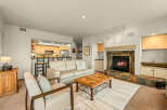 This stunning living room features a cozy fireplace, perfect for relaxing evenings.