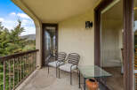 Enjoy the serene views from this charming balcony.