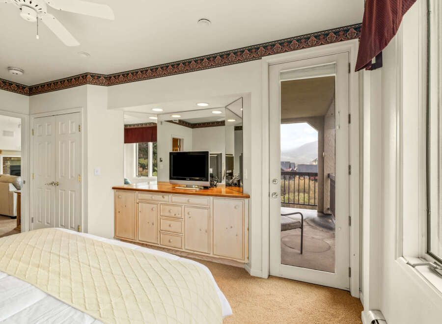 Step into a luxurious bedroom with stunning views and elegant design.
