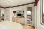 Step into a luxurious bedroom with stunning views and elegant design.
