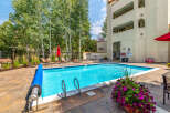 Enjoy a refreshing dip in the sparkling pool, surrounded by lush landscaping and a serene atmosphere.