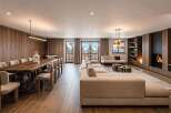 Experience luxury mountain living in this stunning open-concept living and dining area.