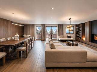 Experience luxury mountain living in this stunning open-concept living and dining area.
