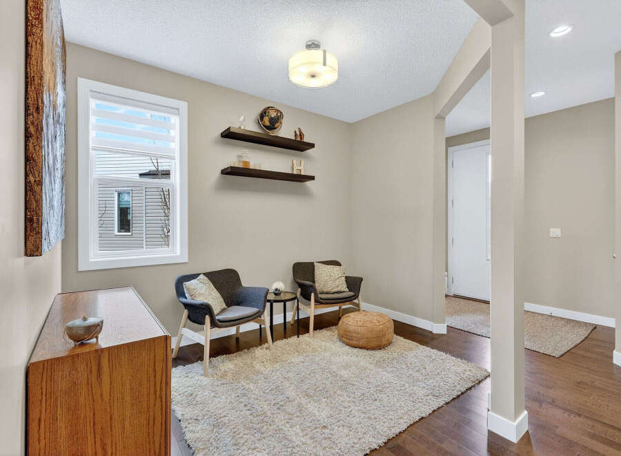 Step into this inviting space, perfect for relaxation and entertaining.