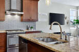 This stunning kitchen boasts a modern design with high-end finishes.
