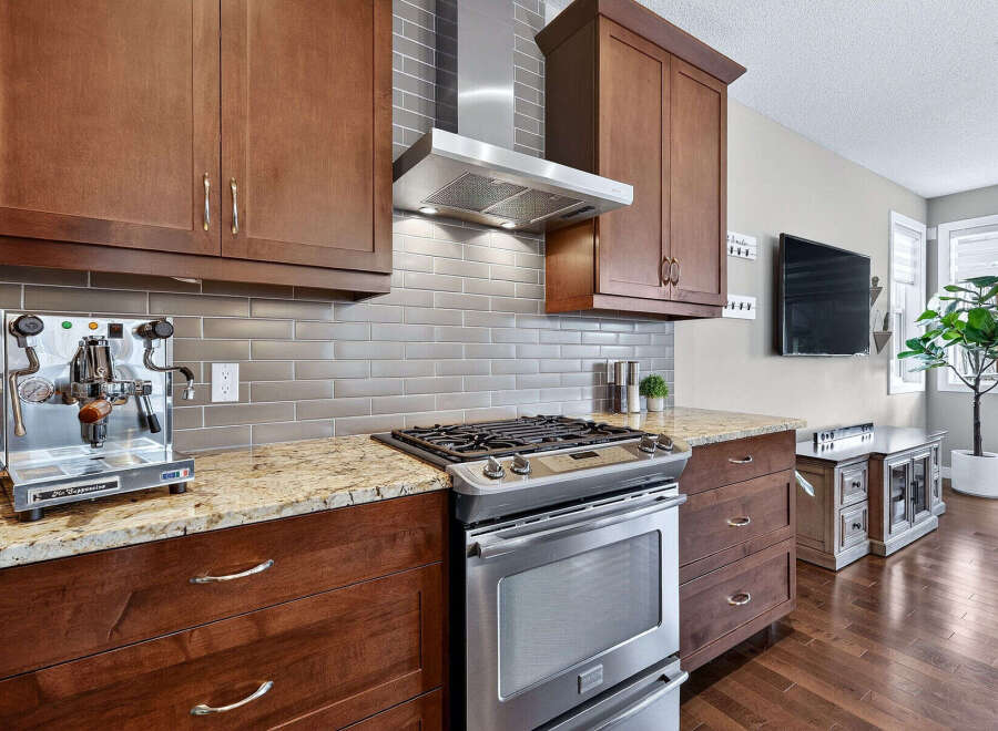 This stunning kitchen boasts modern appliances and elegant design.