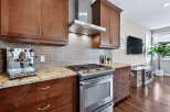 This stunning kitchen boasts modern appliances and elegant design.