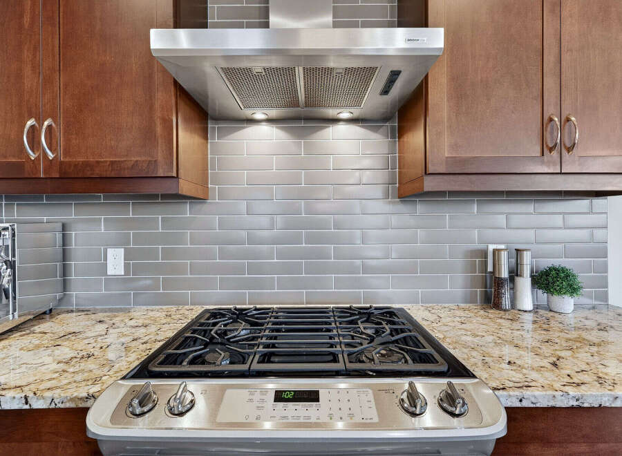 This stunning kitchen boasts modern appliances and elegant design.