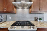 This stunning kitchen boasts modern appliances and elegant design.