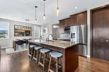 This stunning kitchen boasts a large island with seating, perfect for entertaining.