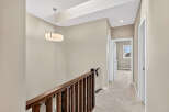 This stunning property features a beautifully designed hallway with a warm and inviting atmosphere.