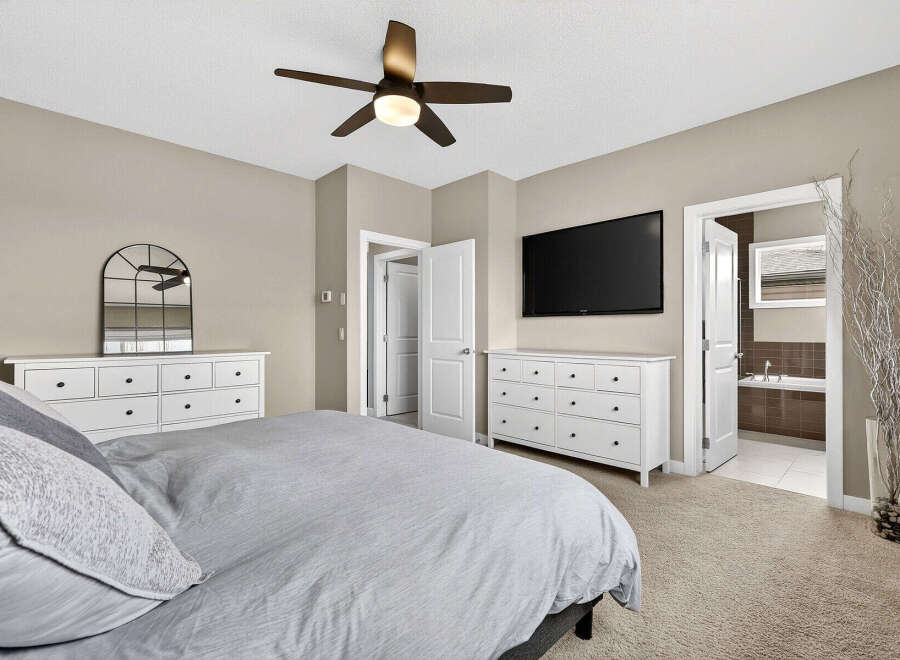 Step into a serene bedroom retreat, featuring a spacious layout and elegant design.
