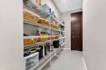 Step into culinary organization with this well-designed pantry.