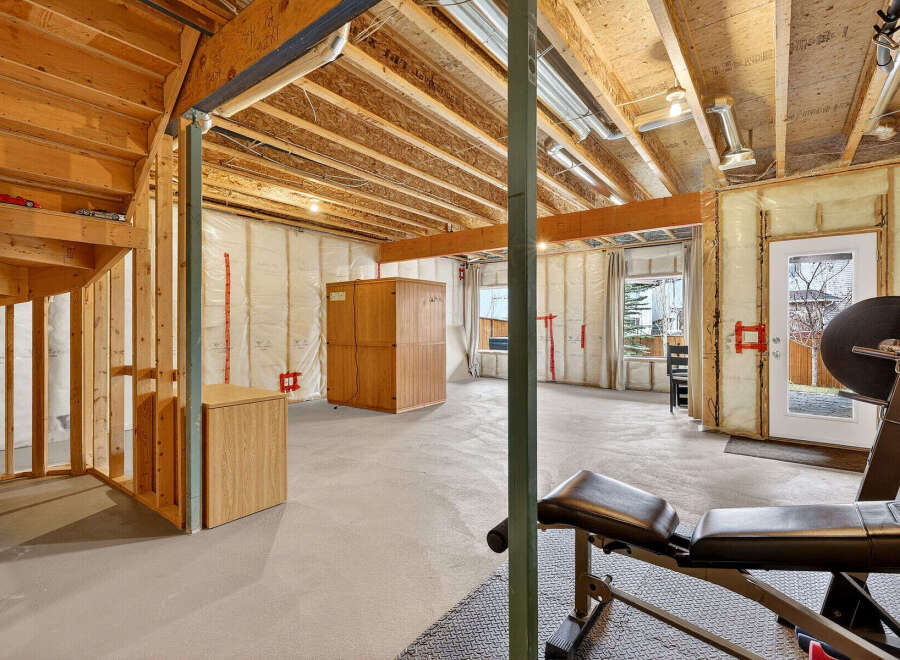 Discover the potential of this spacious unfinished basement, perfect for customization.
