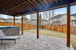 Enjoy outdoor living at its finest with this stunning backyard oasis! Featuring a spacious patio, a relaxing hot tub, and a beautifully landscaped yard, this property is perfect for entertaining or unwinding.