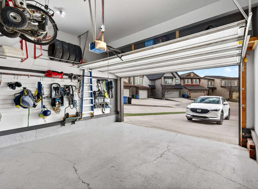 Step into this spacious garage, perfect for storing vehicles and equipment.