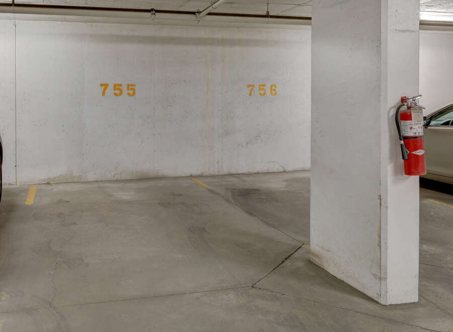 This image showcases a parking garage with designated parking spaces.