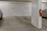 This image showcases a parking garage with designated parking spaces.