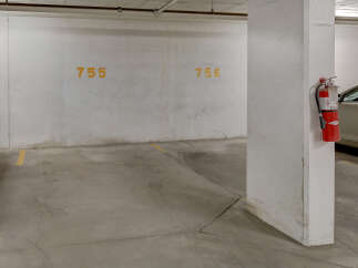 This image showcases a parking garage with designated parking spaces.