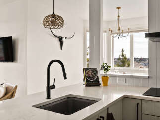 This stunning kitchen boasts modern design and functionality.