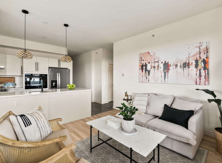 Step into modern elegance with this stunning property, featuring a bright and airy living space.