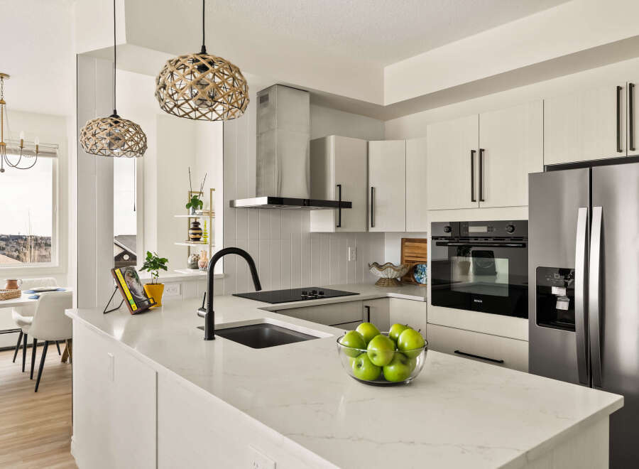 This stunning kitchen boasts modern design and high-end appliances, perfect for culinary enthusiasts.