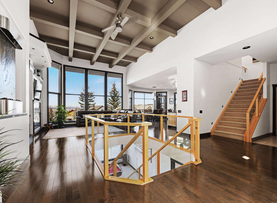 Step into luxury with this stunning property featuring a grand staircase and a modern open floor plan.