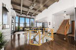 Step into luxury with this stunning property featuring a grand staircase and a modern open floor plan.