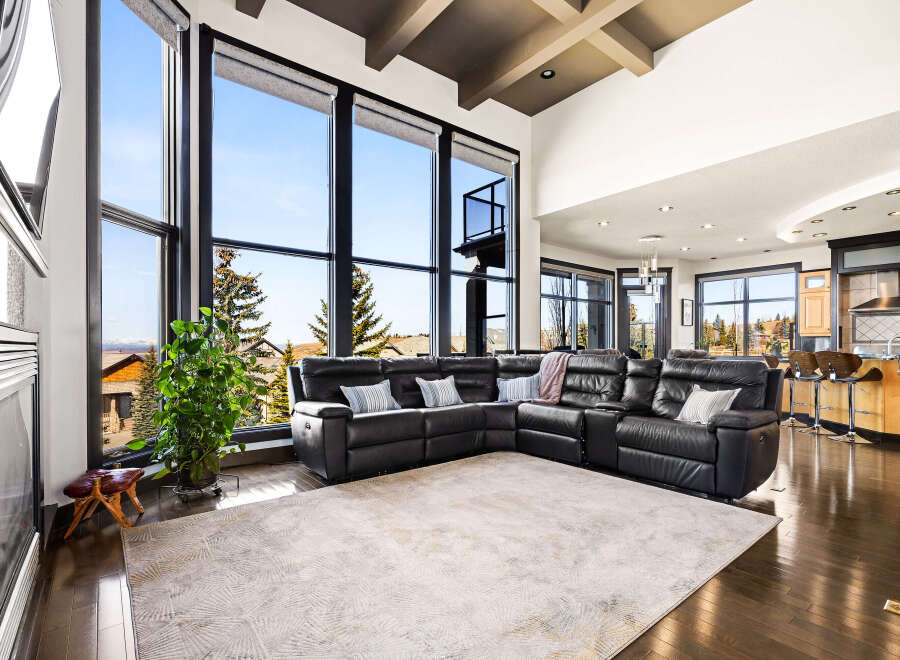 Experience luxury living in this stunning property featuring expansive windows that flood the space with natural light.