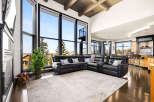 Experience luxury living in this stunning property featuring expansive windows that flood the space with natural light.