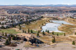 Discover the epitome of luxury living with this stunning property, boasting breathtaking views of a meticulously maintained golf course and serene lake.