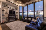 Experience luxury living in this stunning property featuring a cozy fireplace, perfect for chilly evenings.