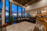 This stunning living room boasts expansive windows that frame breathtaking views.