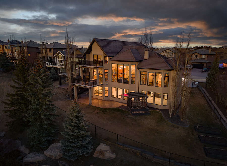 Stunning luxury home with expansive windows and a modern design.