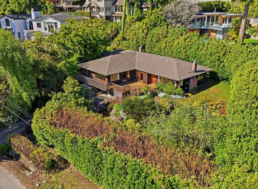 Nestled amidst lush greenery, this stunning property offers a serene retreat.