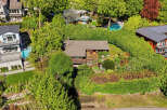 Nestled amidst lush greenery, this stunning property offers a serene escape.