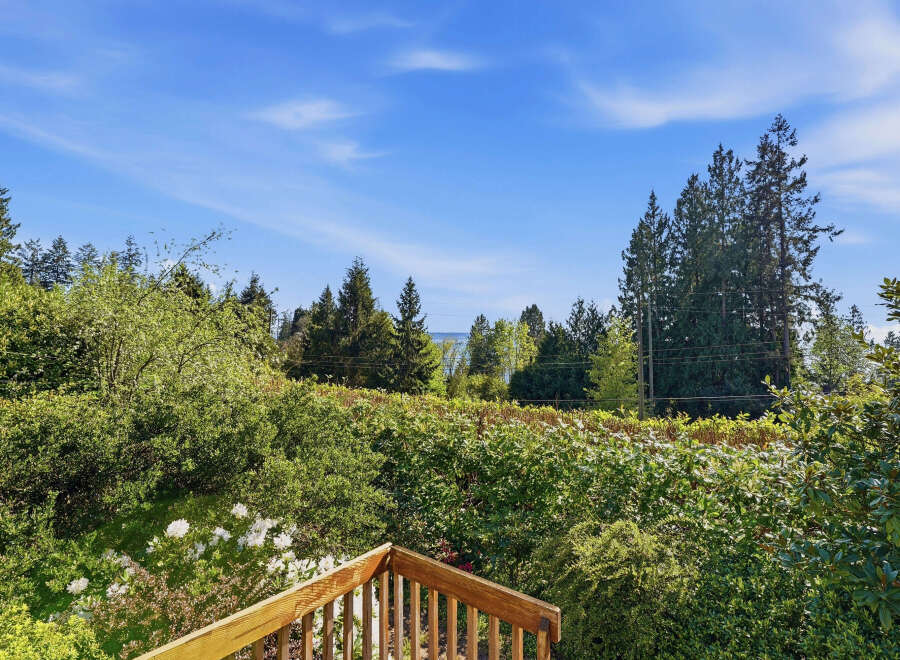 Enjoy breathtaking views from this stunning property! This home features lush greenery and a serene outdoor space, perfect for relaxation.