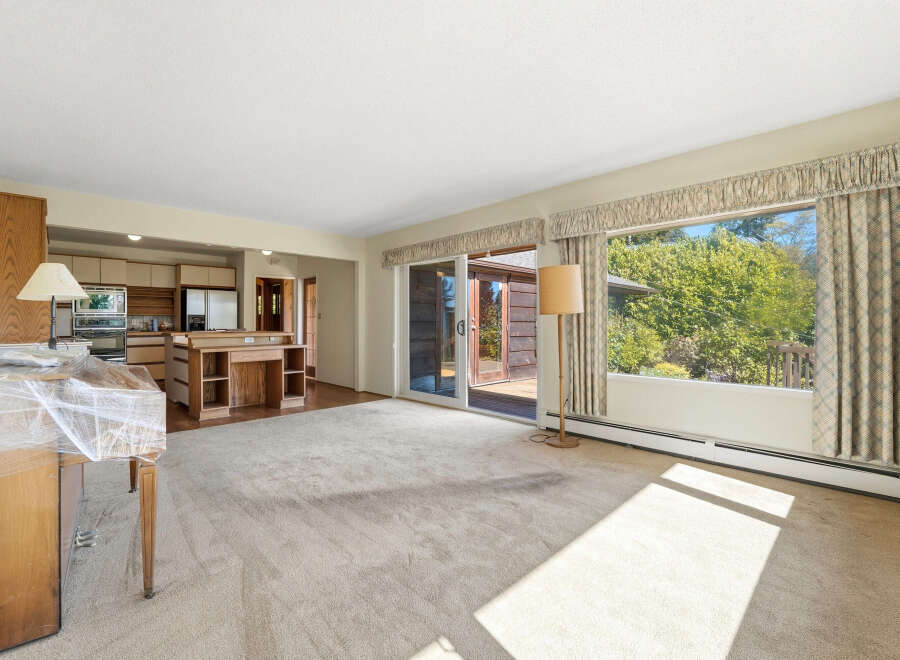 Step into this inviting living space, bathed in natural light and offering a seamless connection to the outdoors.