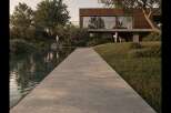 Experience modern luxury in this stunning property, featuring a sleek design and serene surroundings.